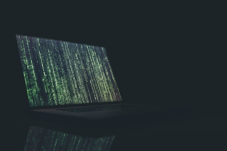 An image of a computer with code on the screen. Courtesy of Unsplash and Markus Spiske